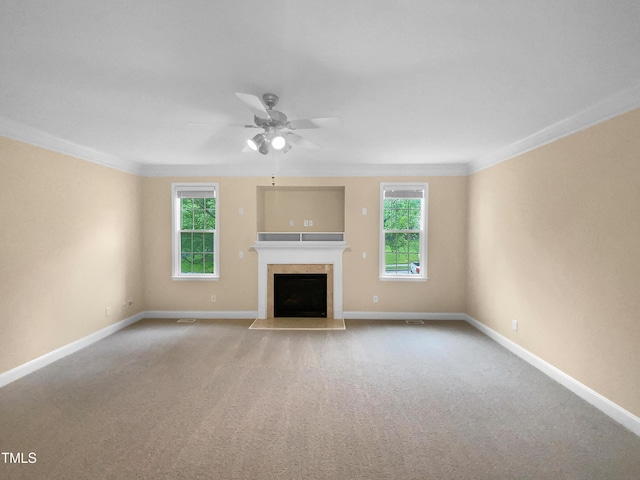 3116 Kirby St, Durham, NC 27713 - unfurnished living room with ceiling fan, ornamental molding, baseboards, a fireplace with flush hearth, and carpet flooring