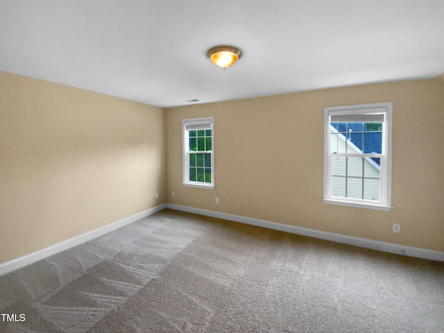 3116 Kirby St, Durham, NC 27713 - carpeted spare room featuring baseboards