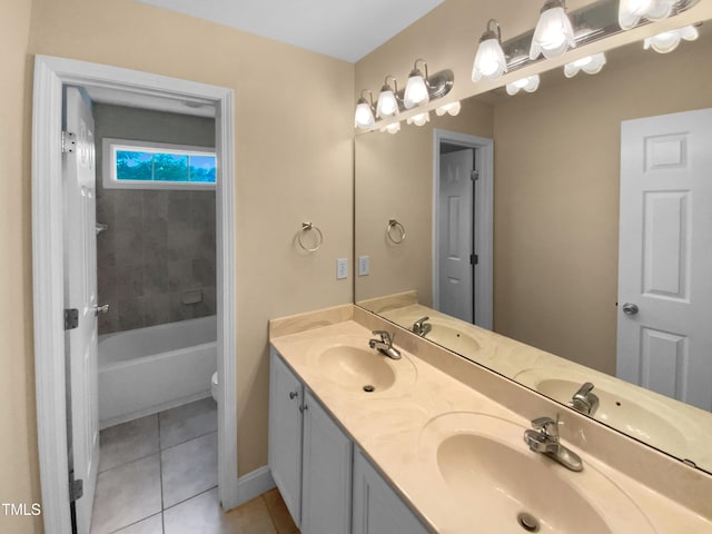 3116 Kirby St, Durham, NC 27713 - full bathroom featuring double vanity, tile patterned floors, toilet, baseboards, and washtub / shower combination