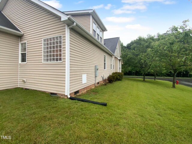 3116 Kirby St, Durham, NC 27713 - view of side of home with a yard and crawl space