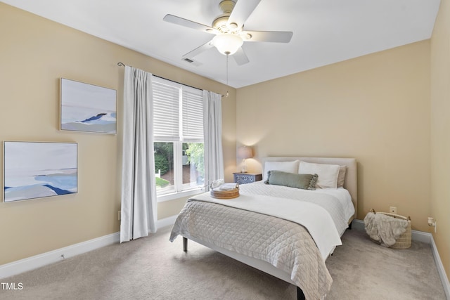 222 Ashton Hall Ln, Raleigh, NC 27609 - bedroom with carpet, baseboards, and ceiling fan