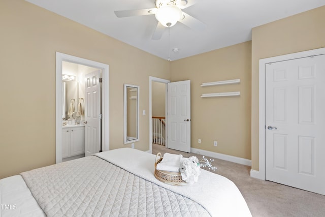 222 Ashton Hall Ln, Raleigh, NC 27609 - bedroom with light colored carpet, connected bathroom, baseboards, and ceiling fan