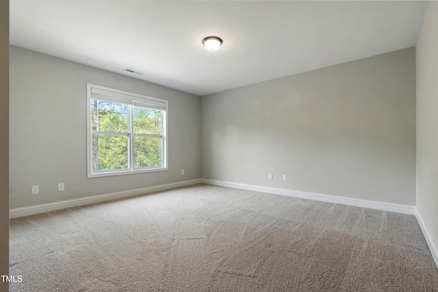550 Spring Flowers Dr, Cameron, NC 28326 - carpeted empty room with baseboards