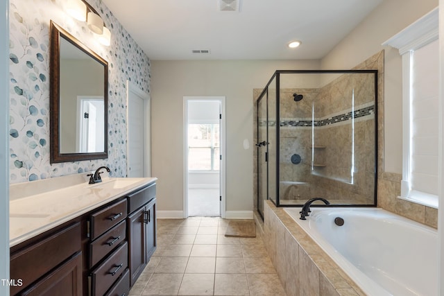 550 Spring Flowers Dr, Cameron, NC 28326 - full bathroom with a bath, double vanity, a shower stall, tile patterned flooring, and baseboards