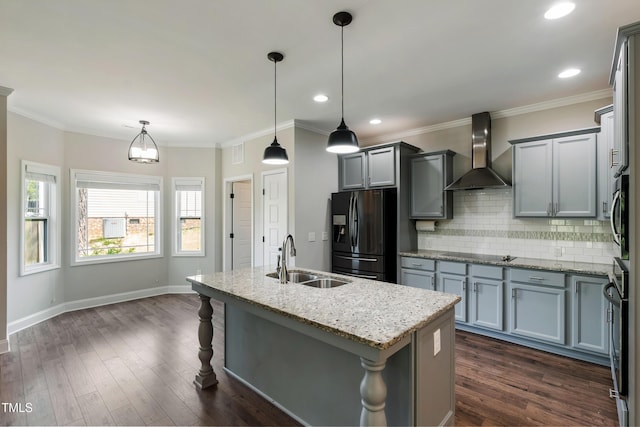 550 Spring Flowers Dr, Cameron, NC 28326 - kitchen featuring refrigerator with ice dispenser, wall chimney exhaust hood, a sink, black electric cooktop, and backsplash
