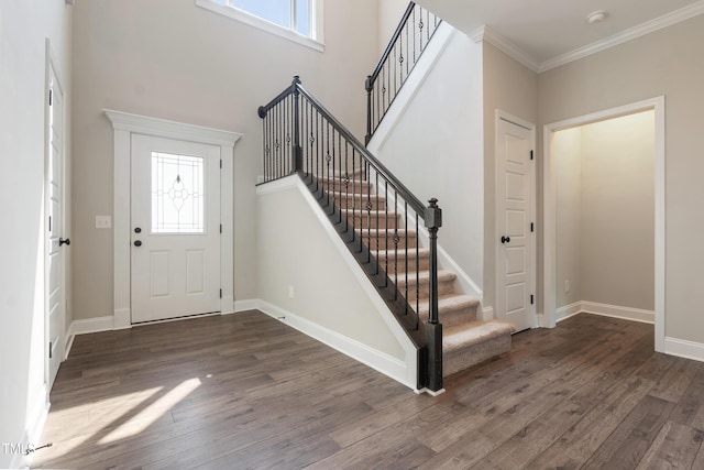 550 Spring Flowers Dr, Cameron, NC 28326 - foyer entrance with wood finished floors, stairs, baseboards, and ornamental molding