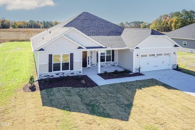 61 Merrifield Ln, Garner, NC 27529 - ranch-style home featuring covered porch, a shingled roof, a garage, board and batten siding, and driveway