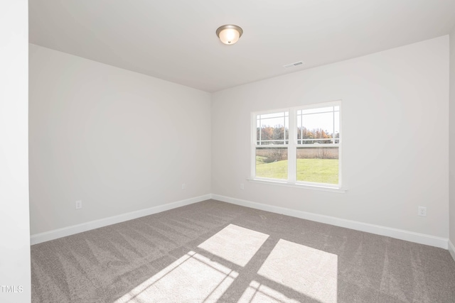 61 Merrifield Ln, Garner, NC 27529 - carpeted spare room featuring baseboards