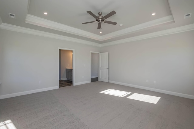 61 Merrifield Ln, Garner, NC 27529 - unfurnished bedroom with a raised ceiling, carpet, crown molding, baseboards, and recessed lighting