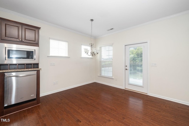 826 Downfield Ln, Fuquay Varina, NC 27526 - unfurnished dining area with a chandelier, dark wood-style flooring, ornamental molding, and baseboards