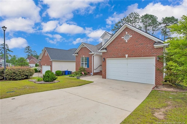 3207 Notting Hill Rd, Fayetteville, NC 28311 - traditional-style house featuring brick siding, driveway, a front yard, and a garage