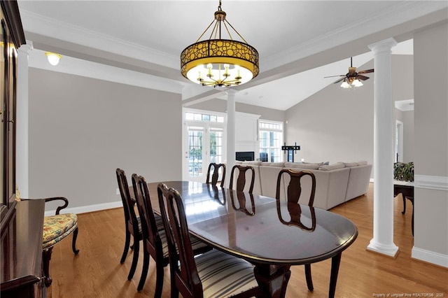 3207 Notting Hill Rd, Fayetteville, NC 28311 - dining area with decorative columns, light wood-style floors, a ceiling fan, baseboards, and lofted ceiling