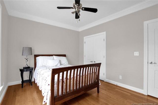 3207 Notting Hill Rd, Fayetteville, NC 28311 - bedroom with crown molding, wood finished floors, baseboards, and ceiling fan