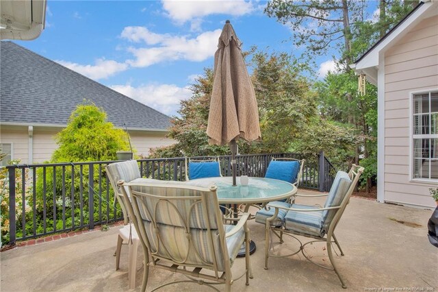 3207 Notting Hill Rd, Fayetteville, NC 28311 - view of patio / terrace with outdoor dining area