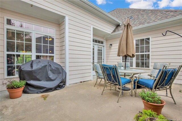 3207 Notting Hill Rd, Fayetteville, NC 28311 - view of patio featuring outdoor dining area and area for grilling
