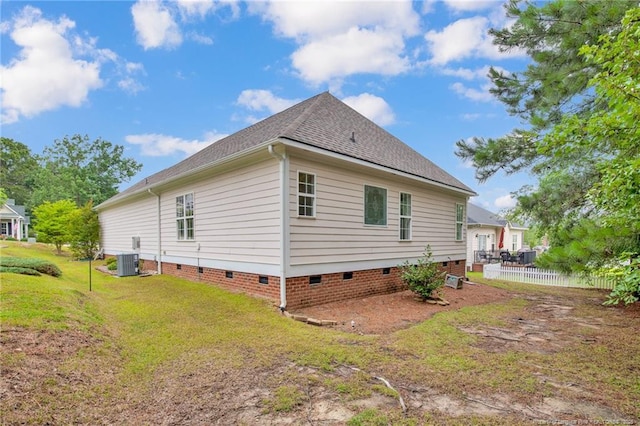 3207 Notting Hill Rd, Fayetteville, NC 28311 - view of home's exterior featuring crawl space, central AC, and roof with shingles