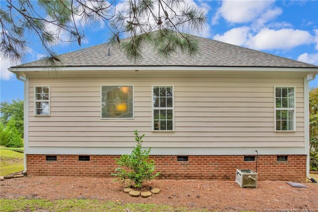 3207 Notting Hill Rd, Fayetteville, NC 28311 - view of property exterior with crawl space and a shingled roof