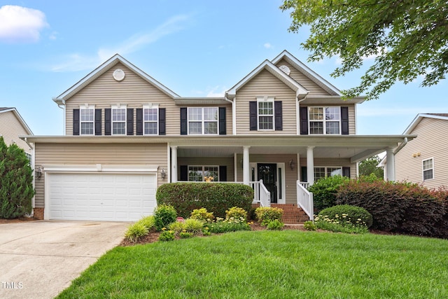 1428 White Opal Dr, Knightdale, NC 27545 - view of front of house with a garage, driveway, a porch, and a front yard