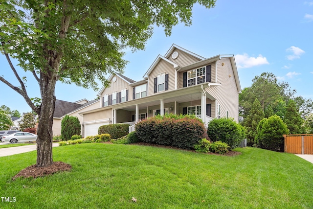 1428 White Opal Dr, Knightdale, NC 27545 - view of front of property featuring an attached garage and a porch