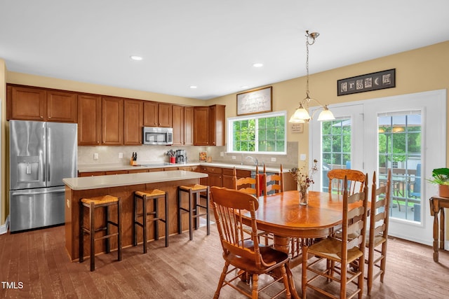 1428 White Opal Dr, Knightdale, NC 27545 - dining space featuring wood finished floors and recessed lighting