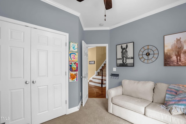 1428 White Opal Dr, Knightdale, NC 27545 - living area with ornamental molding, ceiling fan, carpet floors, stairs, and baseboards