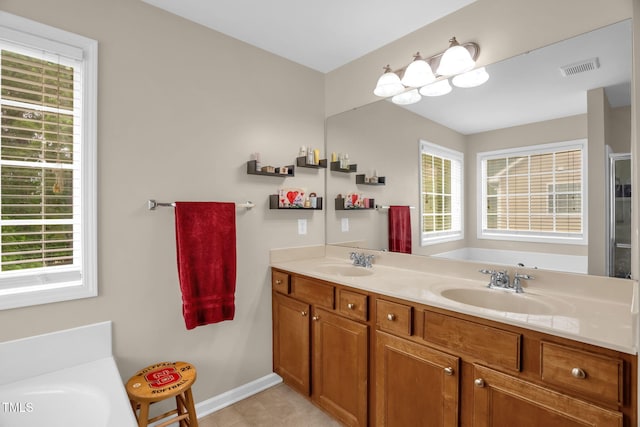 1428 White Opal Dr, Knightdale, NC 27545 - bathroom with a bath and healthy amount of natural light
