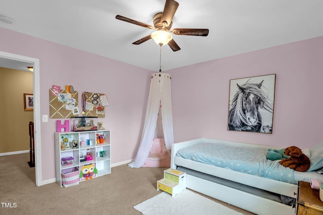 1428 White Opal Dr, Knightdale, NC 27545 - carpeted bedroom featuring baseboards and ceiling fan