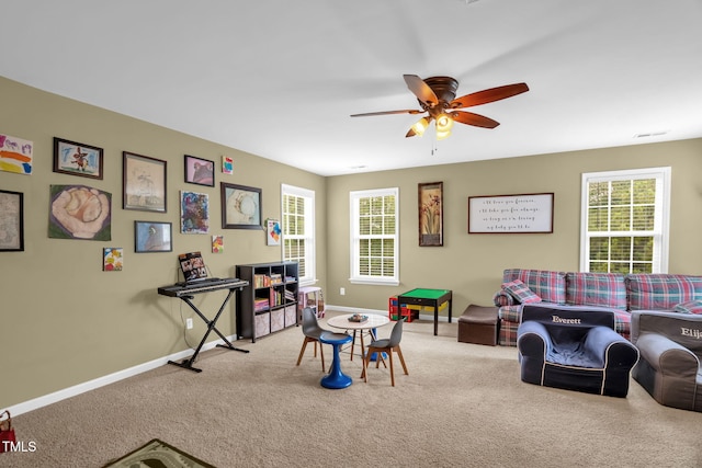 1428 White Opal Dr, Knightdale, NC 27545 - recreation room featuring carpet floors, ceiling fan, baseboards, and healthy amount of natural light
