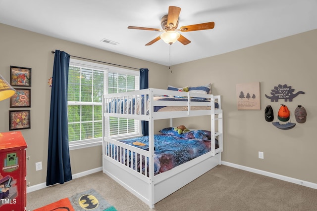 1428 White Opal Dr, Knightdale, NC 27545 - carpeted bedroom featuring baseboards and a ceiling fan