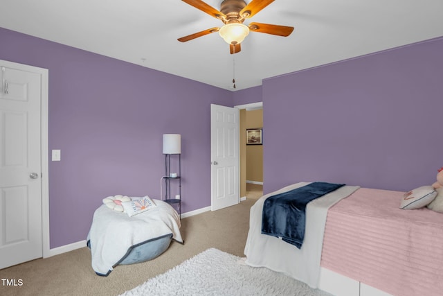 1428 White Opal Dr, Knightdale, NC 27545 - bedroom with carpet floors, baseboards, and ceiling fan