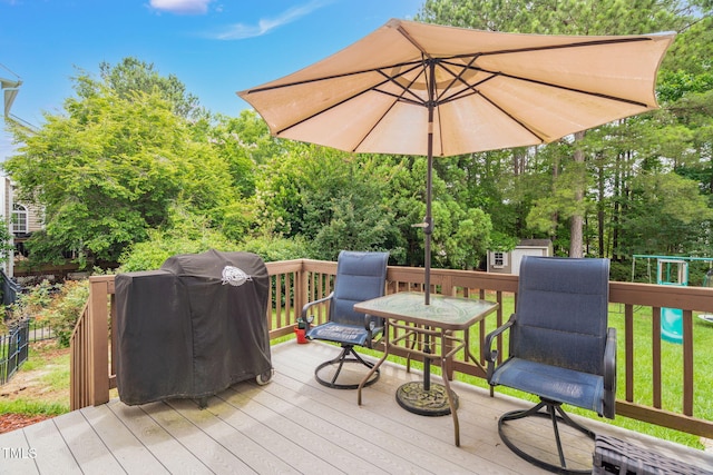 1428 White Opal Dr, Knightdale, NC 27545 - wooden terrace with area for grilling and view of scattered trees