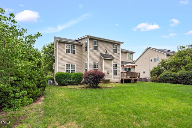 1428 White Opal Dr, Knightdale, NC 27545 - back of property with a lawn, crawl space, and a wooden deck
