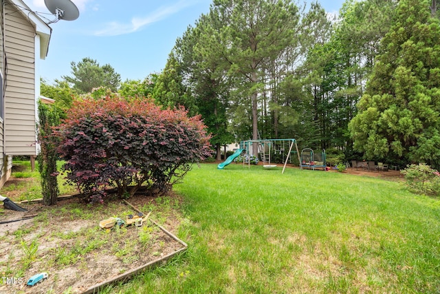 1428 White Opal Dr, Knightdale, NC 27545 - view of grassy yard with a playground