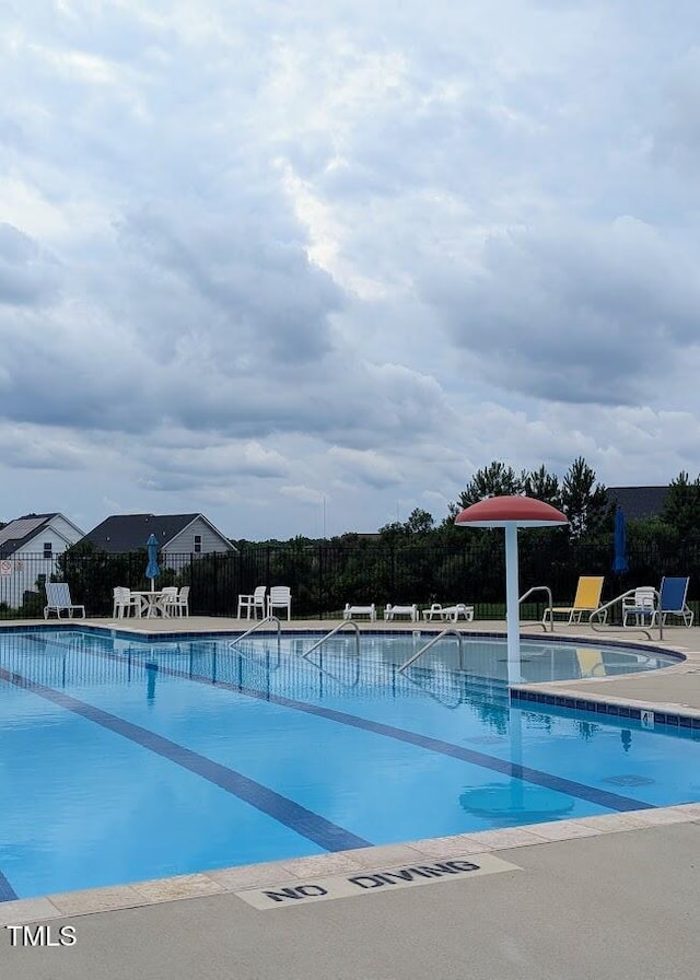 1428 White Opal Dr, Knightdale, NC 27545 - community pool featuring a patio area
