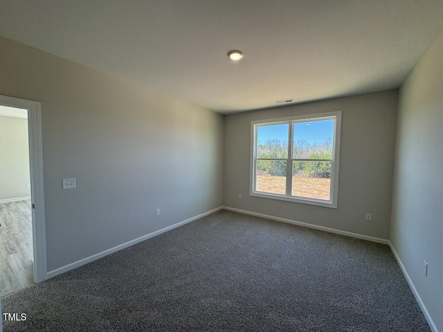 140 Brookhaven Dr, Spring Hope, NC 27882 - unfurnished room featuring carpet and baseboards