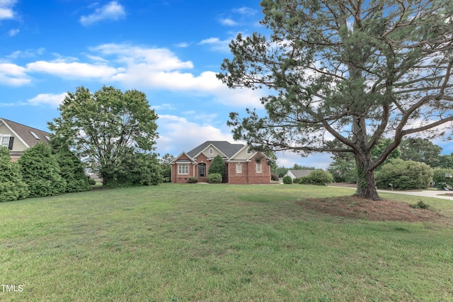 7800 Twin Pines Way, Fuquay Varina, NC 27526 - view of front of property with a front lawn and brick siding