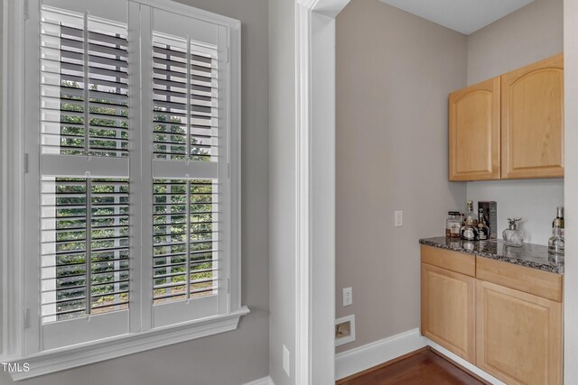 7800 Twin Pines Way, Fuquay Varina, NC 27526 - indoor dry bar with baseboards and dark wood-type flooring
