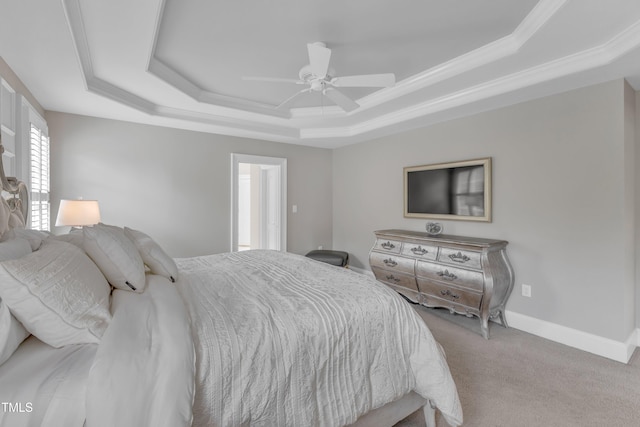 7800 Twin Pines Way, Fuquay Varina, NC 27526 - carpeted bedroom with a tray ceiling, crown molding, ceiling fan, and baseboards