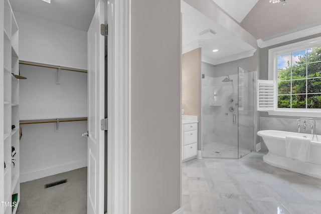 7800 Twin Pines Way, Fuquay Varina, NC 27526 - bathroom with a shower stall, a spacious closet, a freestanding tub, and marble finish floors