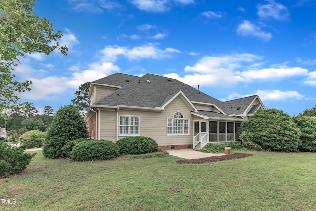 7800 Twin Pines Way, Fuquay Varina, NC 27526 - back of property featuring a sunroom, a patio, a lawn, a shingled roof, and crawl space