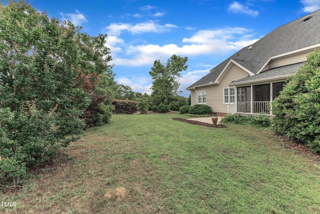 7800 Twin Pines Way, Fuquay Varina, NC 27526 - view of grassy yard with a sunroom