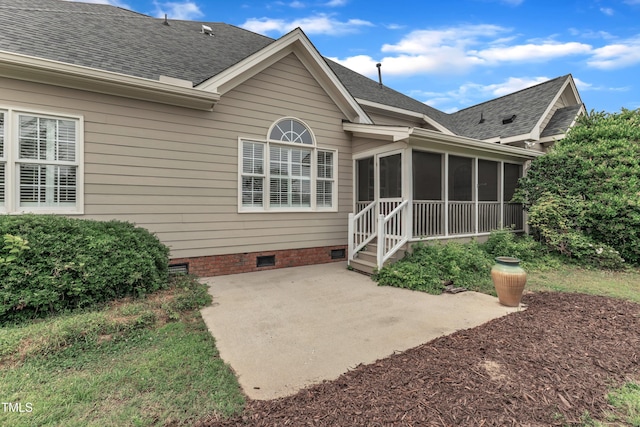 7800 Twin Pines Way, Fuquay Varina, NC 27526 - back of property featuring a patio, a sunroom, crawl space, and a shingled roof