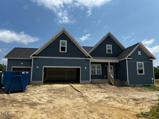 129 Retreat Run, Smithfield, NC 27577 - craftsman house featuring an attached garage