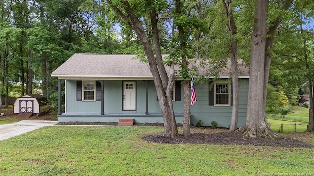 2308 Keith Dr, Raleigh, NC 27610 - single story home with a porch and roof with shingles
