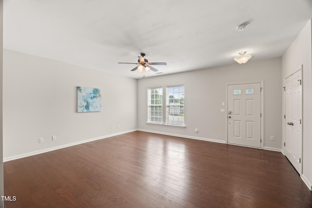 1108 Renewal Pl, Raleigh, NC 27603 - foyer entrance with ceiling fan, dark wood-style floors, and baseboards