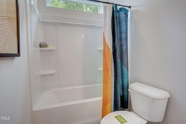 128 Bruce Dr, Dunn, NC 28334 - bathroom featuring toilet and shower / bath combination with curtain
