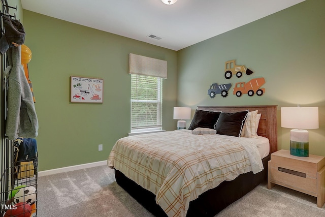128 Bruce Dr, Dunn, NC 28334 - bedroom with carpet floors and baseboards