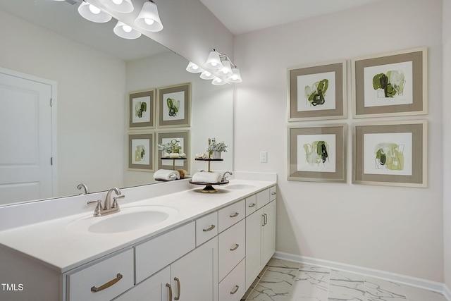 128 Bruce Dr, Dunn, NC 28334 - full bathroom with double vanity, marble finish flooring, and baseboards