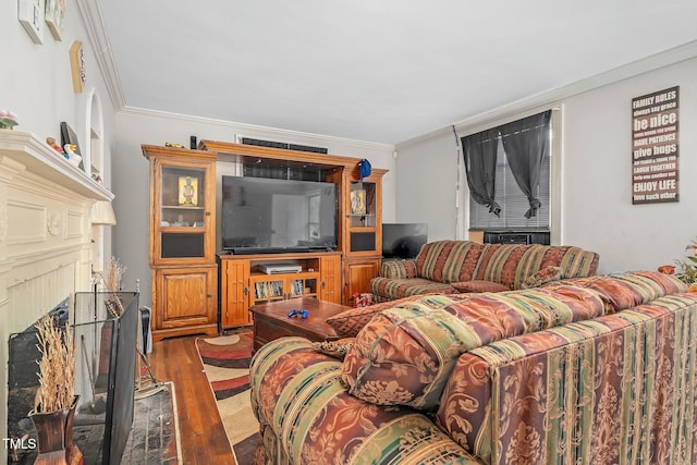 940 Hill St, Rocky Mount, NC 27801 - living room featuring wood finished floors, crown molding, and a fireplace