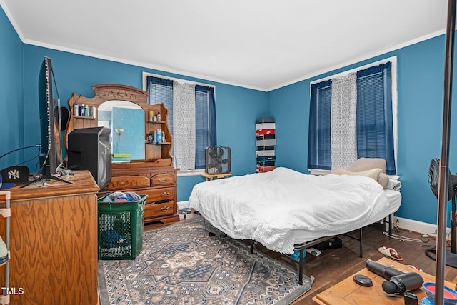 940 Hill St, Rocky Mount, NC 27801 - bedroom featuring wood finished floors and ornamental molding